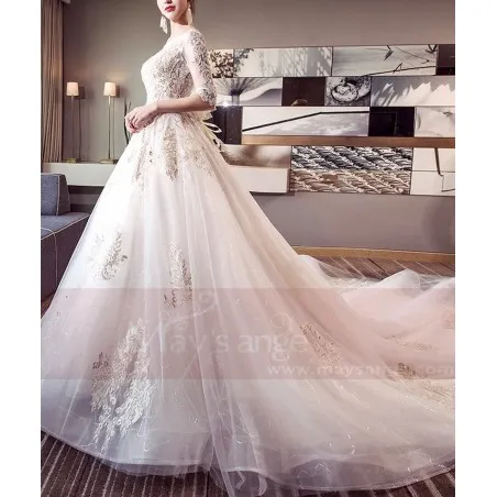 belle robe de mariée demi-manche dentelle grand nœud papillon amovible