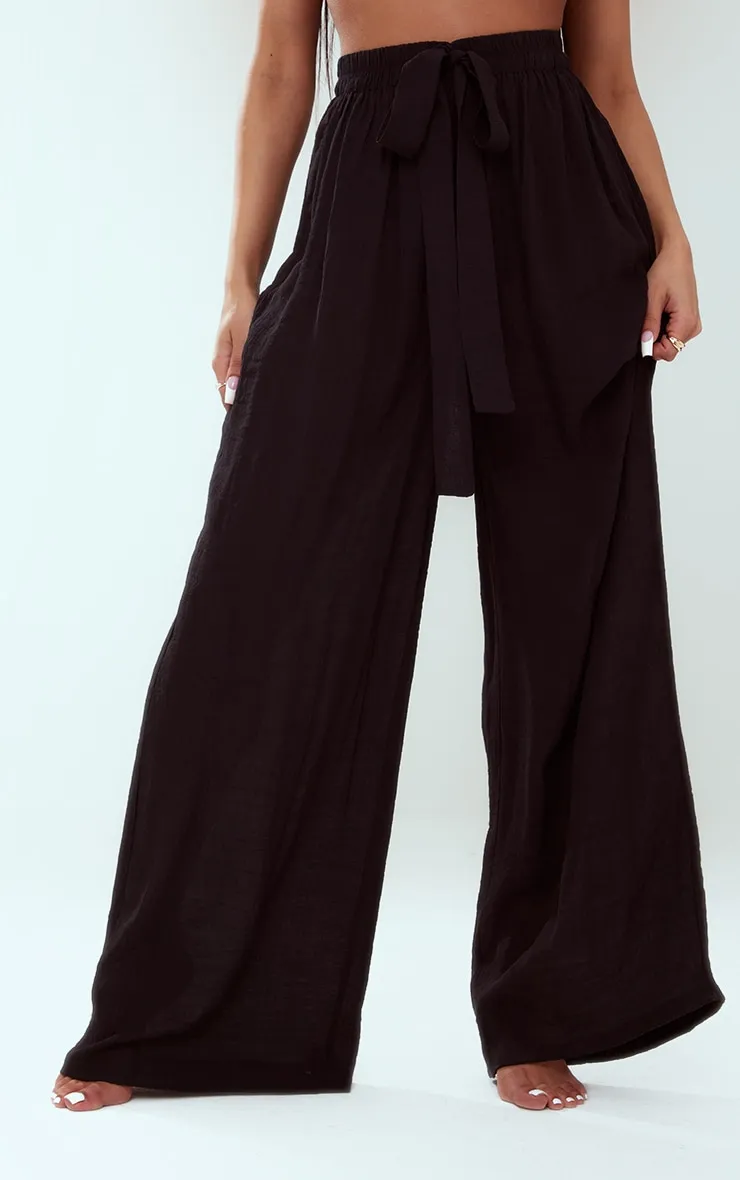 Pantalon palazzo noir effet lin