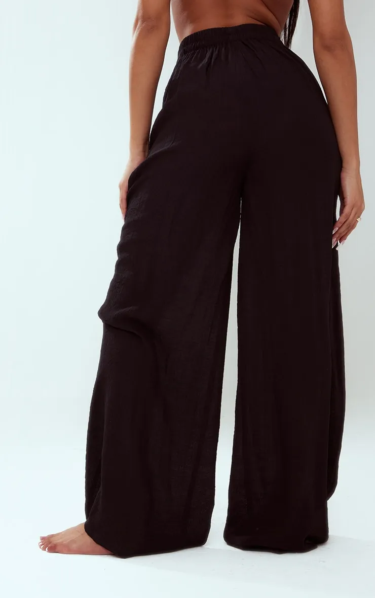 Pantalon palazzo noir effet lin