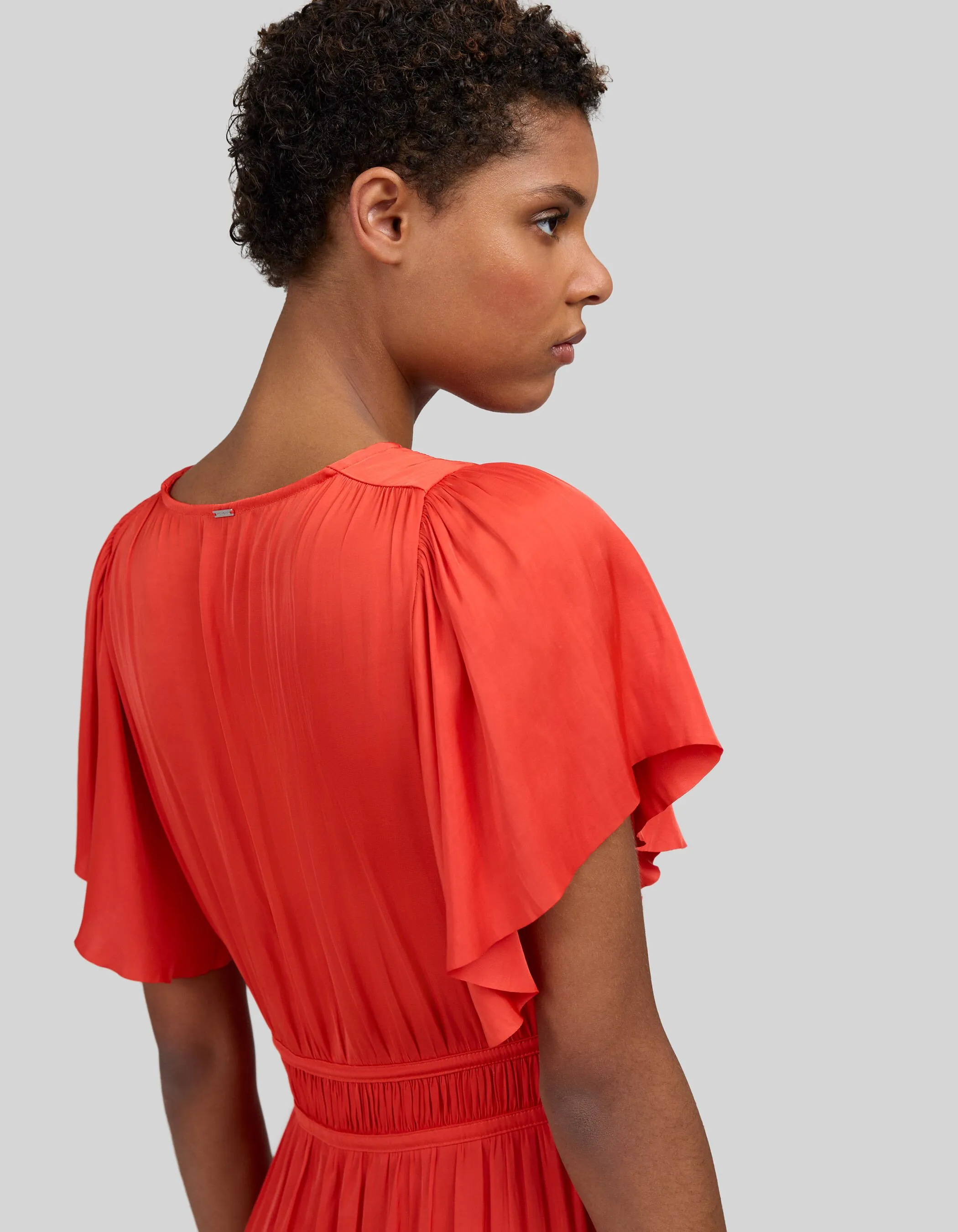 Robe orange froissée manches papillon Femme